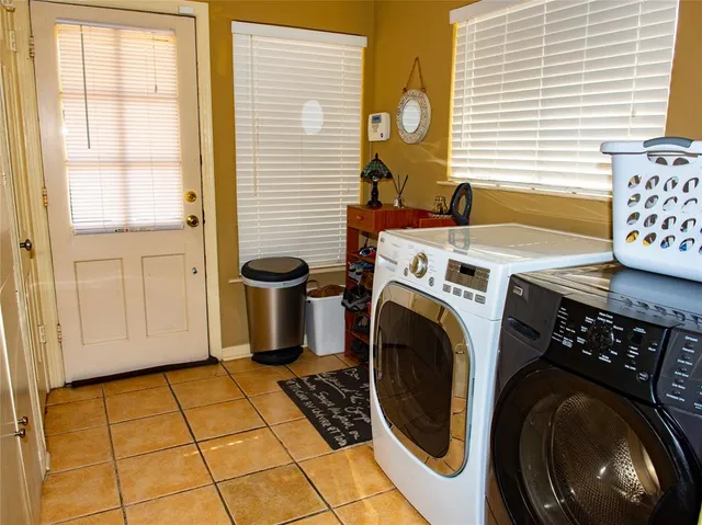 a view of a washer and dryer in a utility room