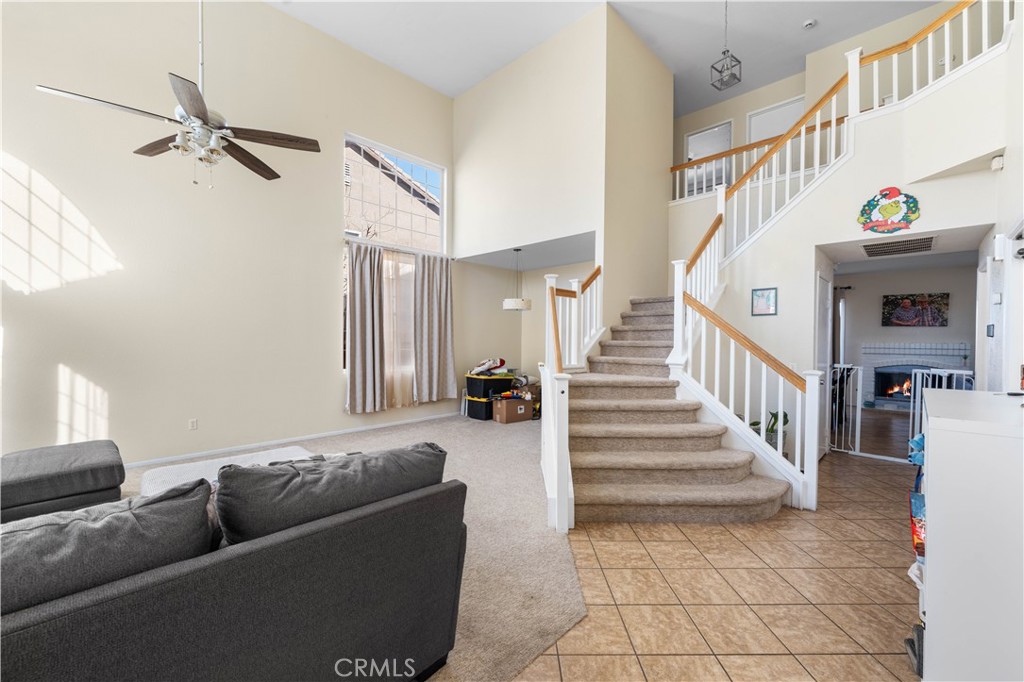 36624 Roosevelt Drive Palmdale, CA 93552 - Photo 3 of 12 a living room with furniture and stairs