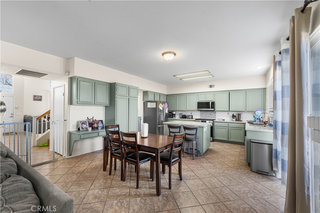 36624 Roosevelt Drive Palmdale, CA 93552 - Photo 7 of 12 a view of a dining room kitchen and a window