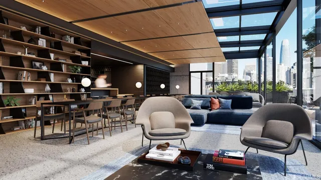 a living room with furniture and a floor to ceiling window