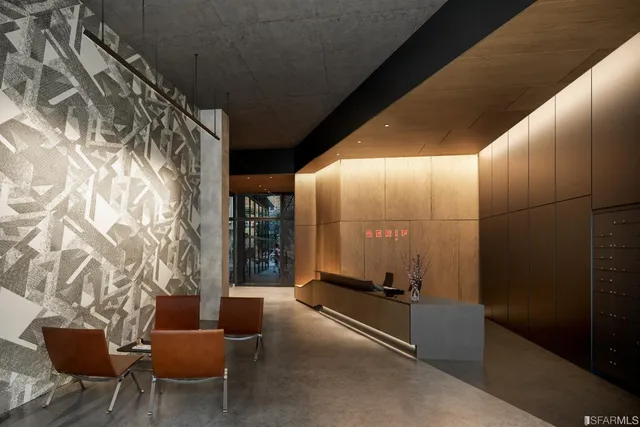 a view of a chairs and table in a room