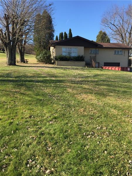 Home sets back off the road..  Has a beautiful level yard. Plus a  paved driveway. 