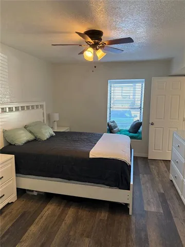 a bathroom with a sink vanity and mirror