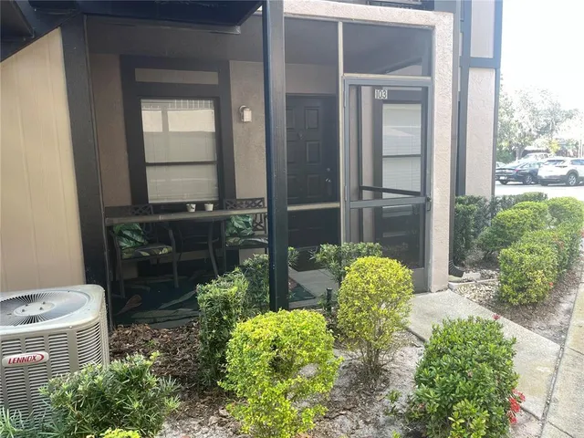 a view of a house with a garden