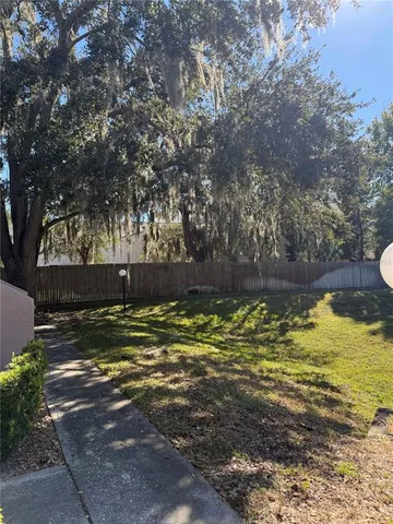 a view of a park with of trees