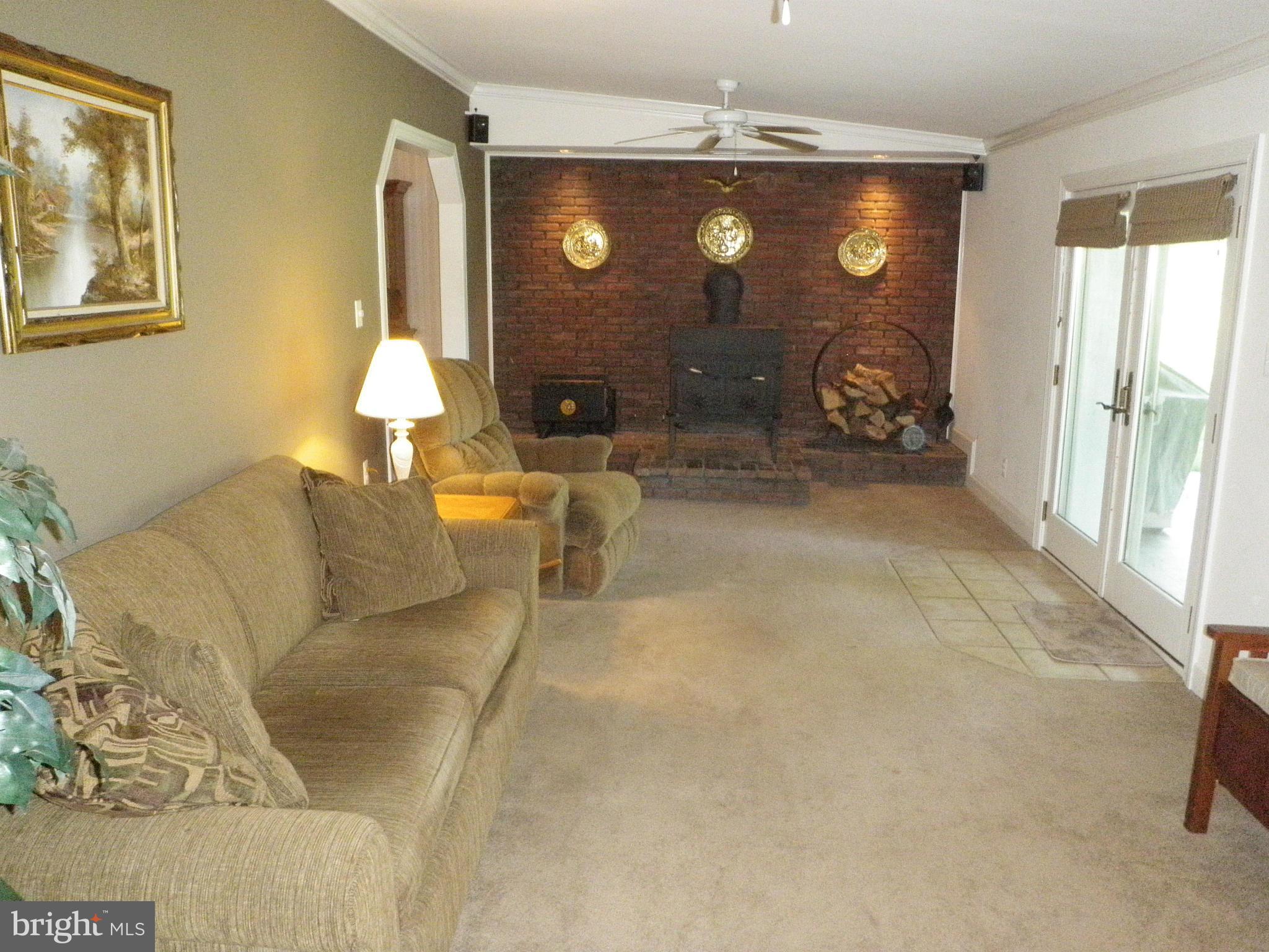 1608 Colony Road Pasadena, MD 21122 - Photo 12 of 30 Family Room w/ French door to huge yard
