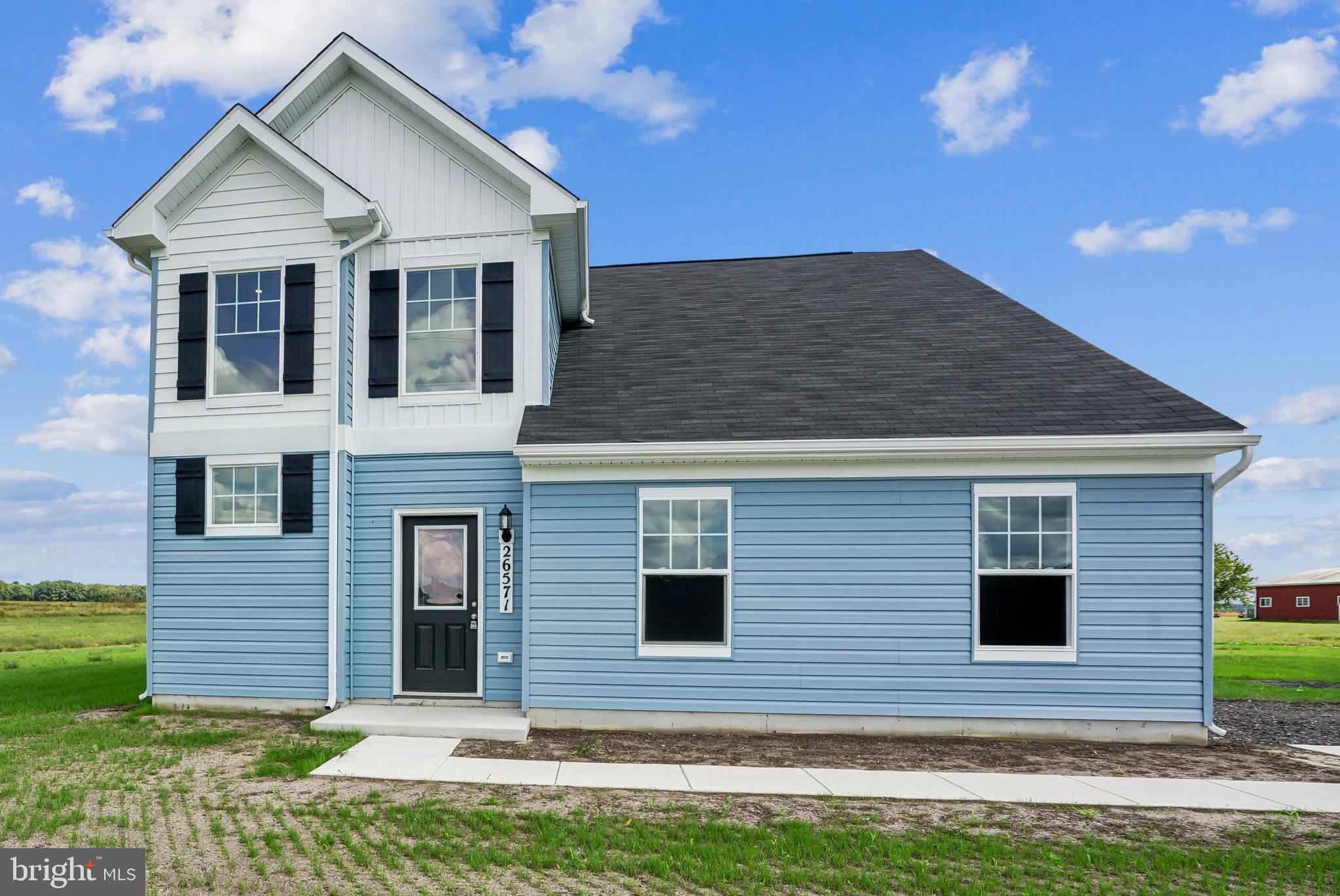 a front view of house with yard