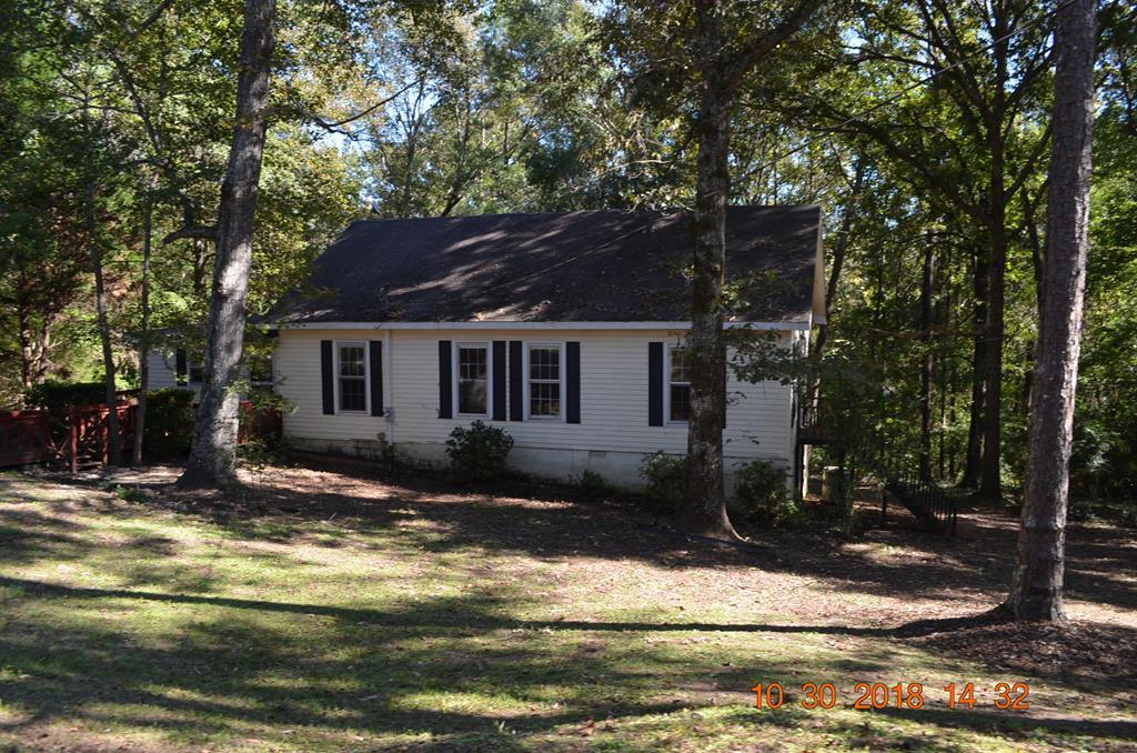 275 Jackson Lindsey Road Forsyth, GA 31029 - Photo 1 of 16 front view of a house with a yard