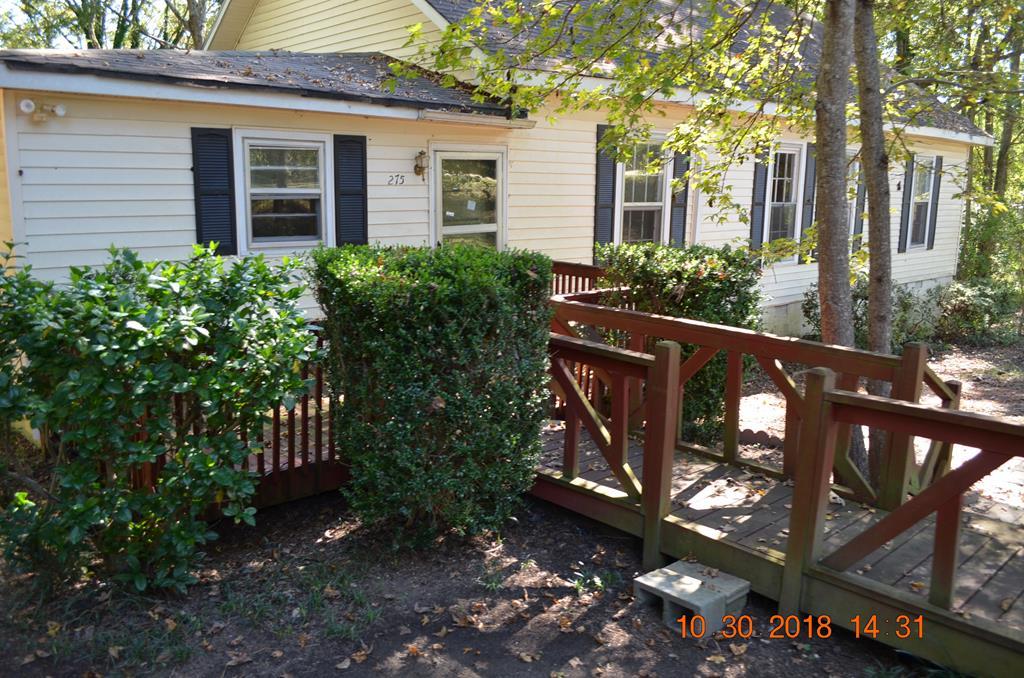 275 Jackson Lindsey Road Forsyth, GA 31029 - Photo 13 of 16 a view of a house with brick walls