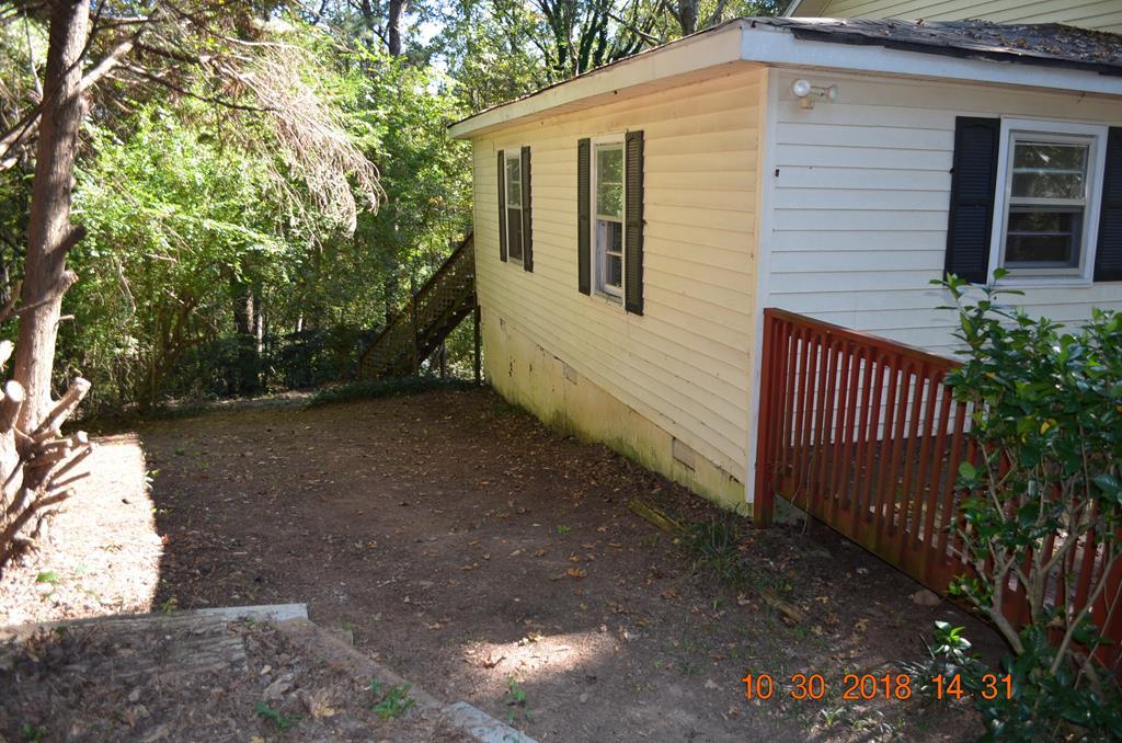 275 Jackson Lindsey Road Forsyth, GA 31029 - Photo 14 of 16 a view of a house with a yard
