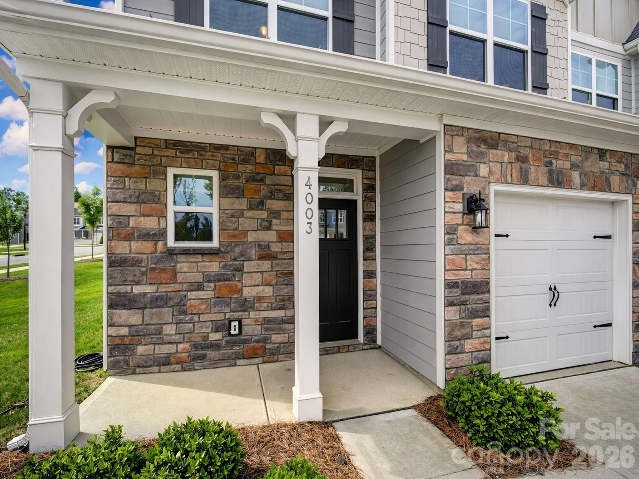 4003 Rothwood Lane Harrisburg, NC 28075 - Photo 2 of 30 a view of front door and small building