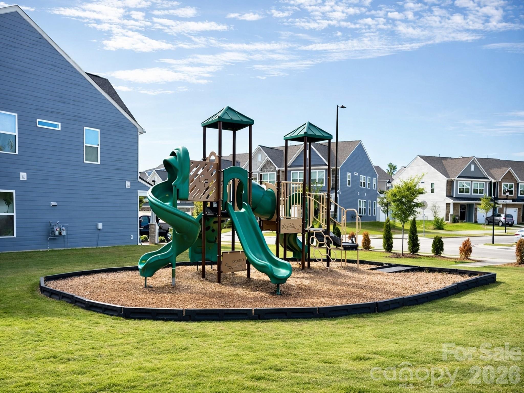 4003 Rothwood Lane Harrisburg, NC 28075 - Photo 30 of 30 a view of a house with a swimming pool