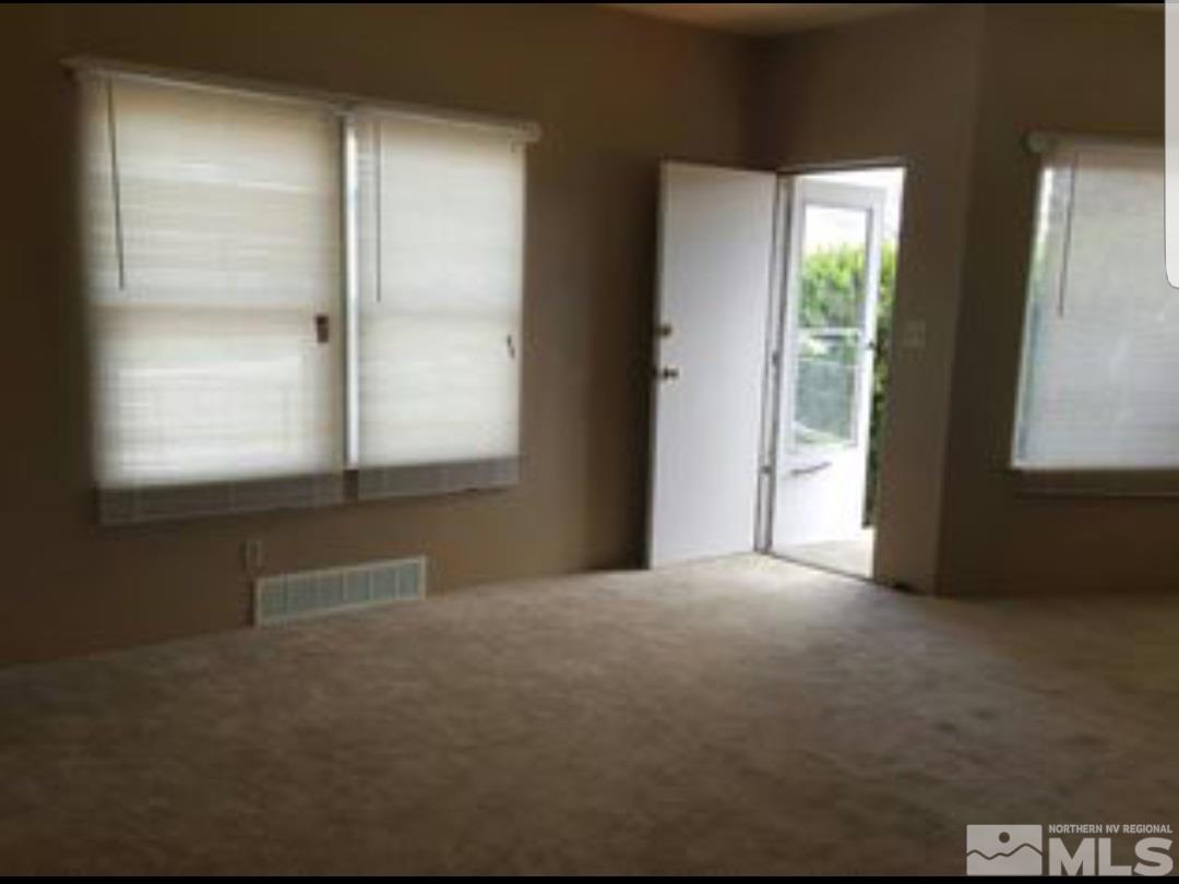 1285 East 9th Street Reno, NV 89512 - Photo 5 of 13 a view of an empty room with a window