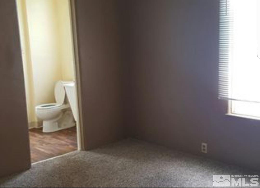 1285 East 9th Street Reno, NV 89512 - Photo 9 of 13 a bathroom with a toilet