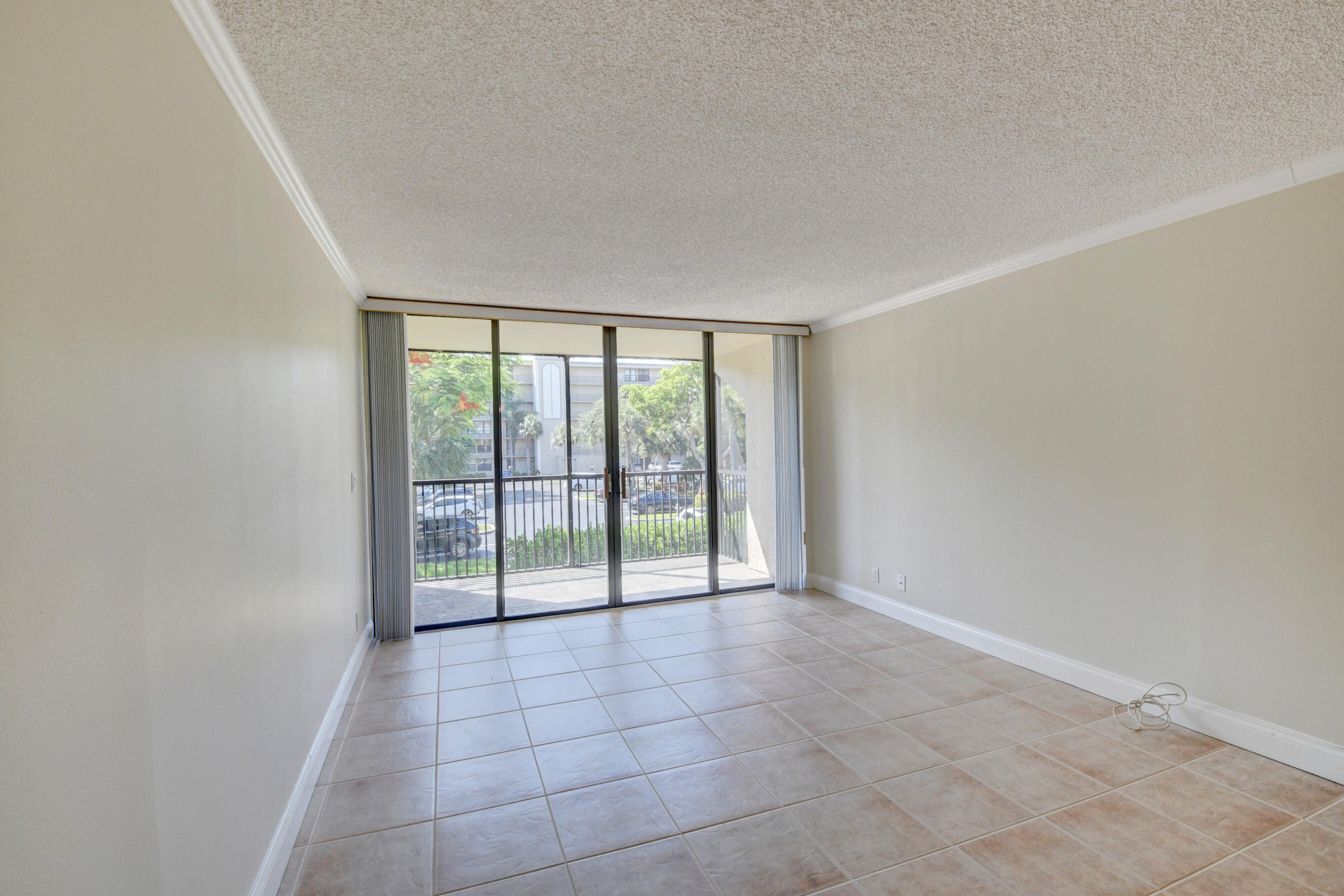 16 Royal Palm Way, Unit 202 Boca Raton, FL 33432 - Photo 16 of 54 a view of an empty room with a window