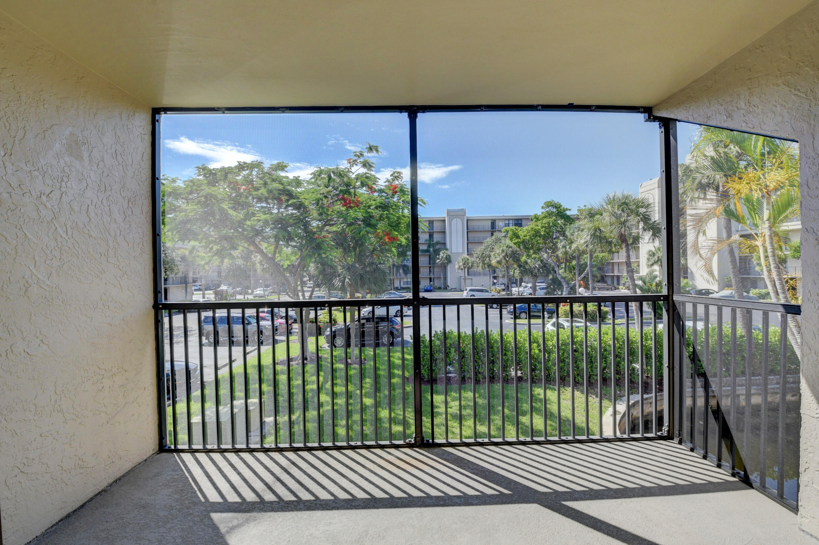 16 Royal Palm Way, Unit 202 Boca Raton, FL 33432 - Photo 19 of 54 a view of a balcony with floor to ceiling window