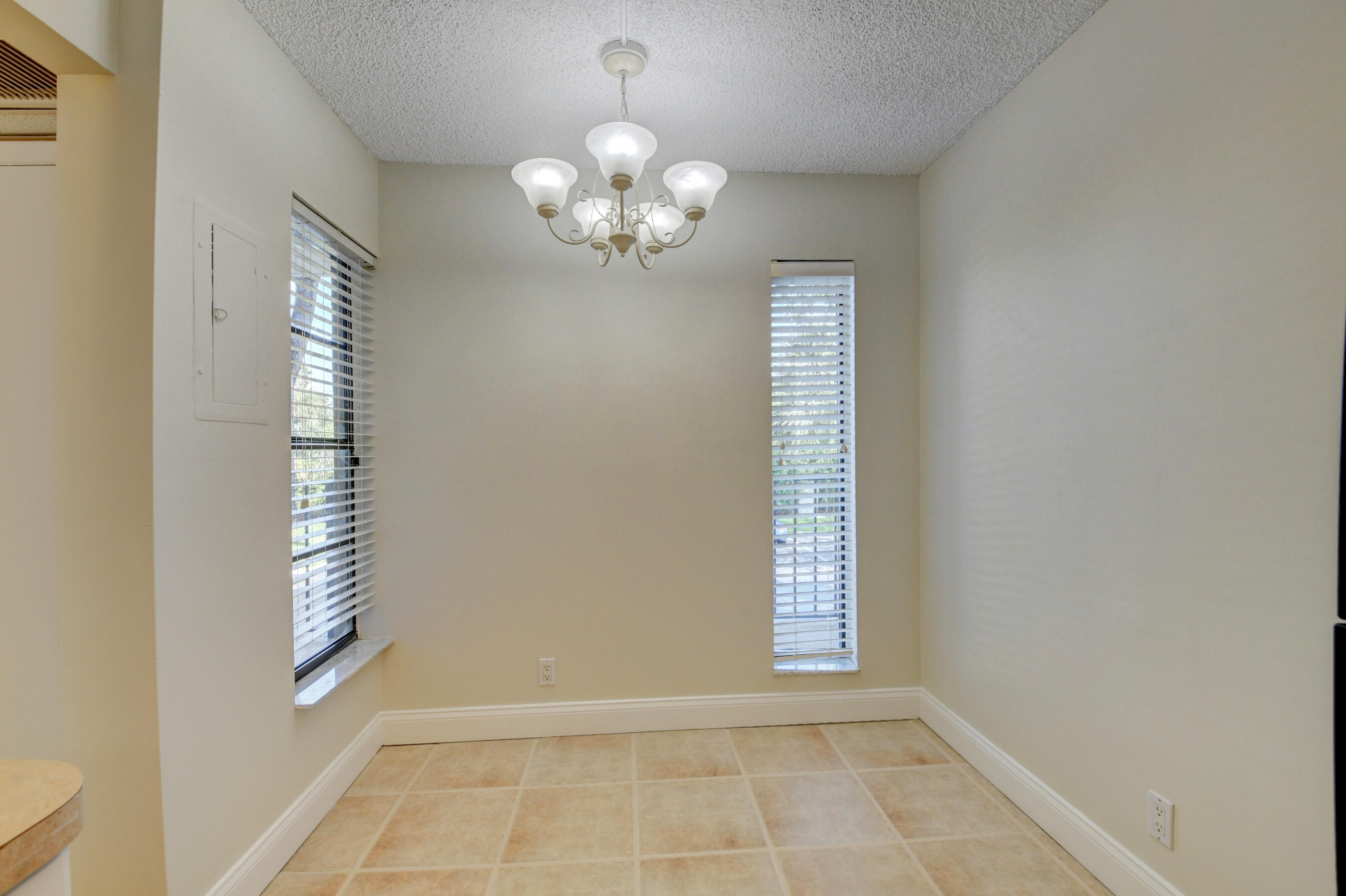 16 Royal Palm Way, Unit 202 Boca Raton, FL 33432 - Photo 8 of 54 a view of an empty room with a window