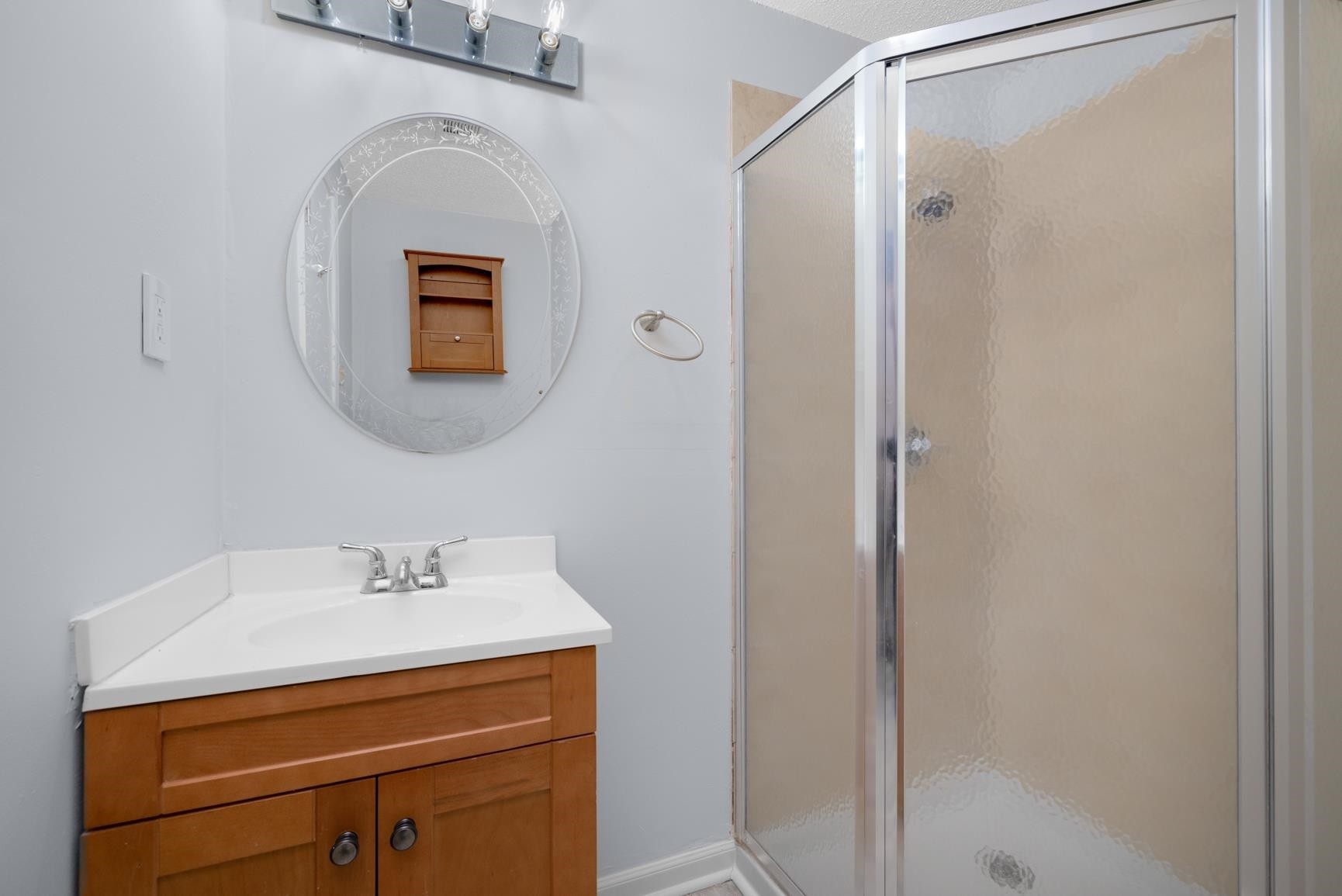 5364 Virgil Road Memphis, TN 38134 - Photo 22 of 32 a bathroom with a sink and a mirror