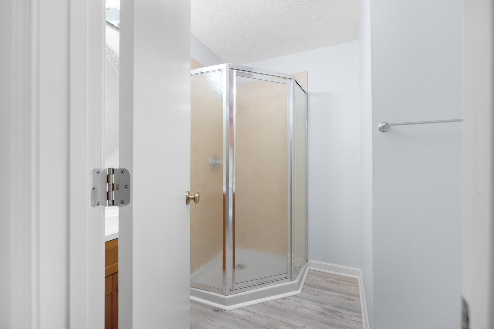 5364 Virgil Road Memphis, TN 38134 - Photo 23 of 32 a bathroom with a glass shower door