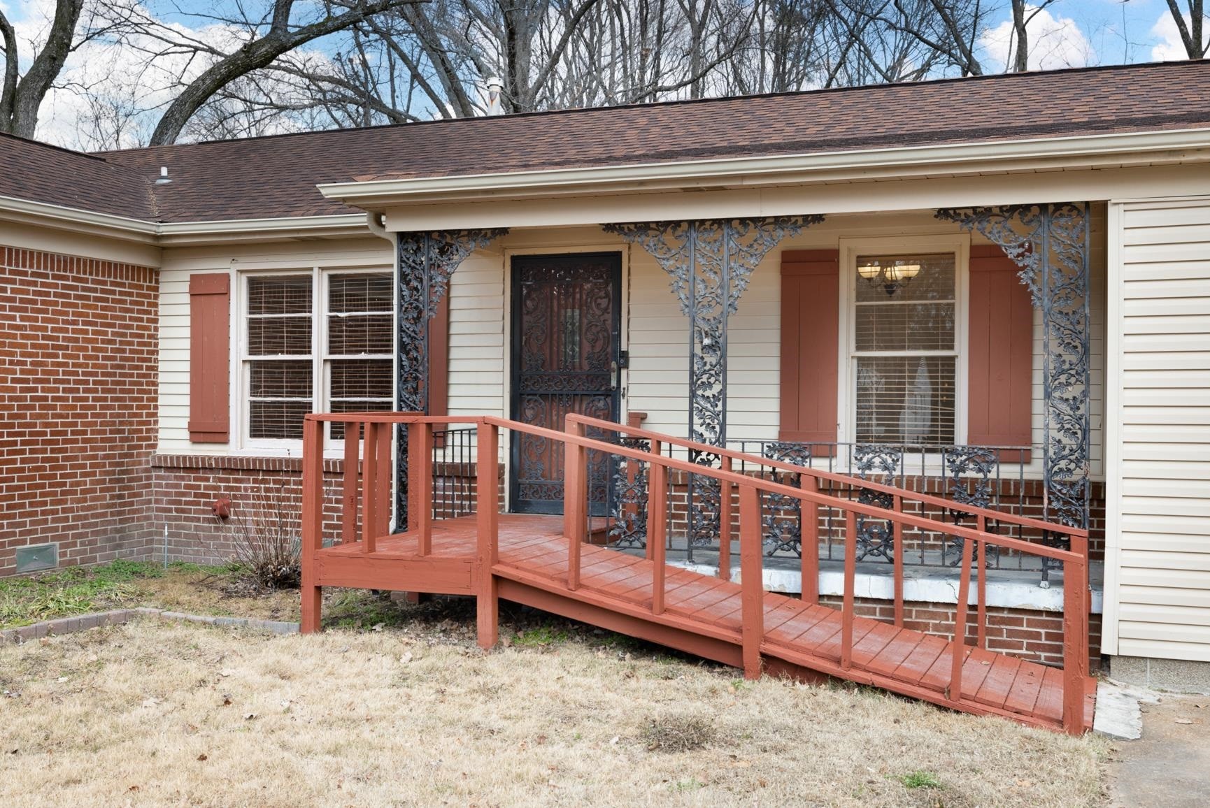 5364 Virgil Road Memphis, TN 38134 - Photo 3 of 32 a view of a house with wooden fence in front of it