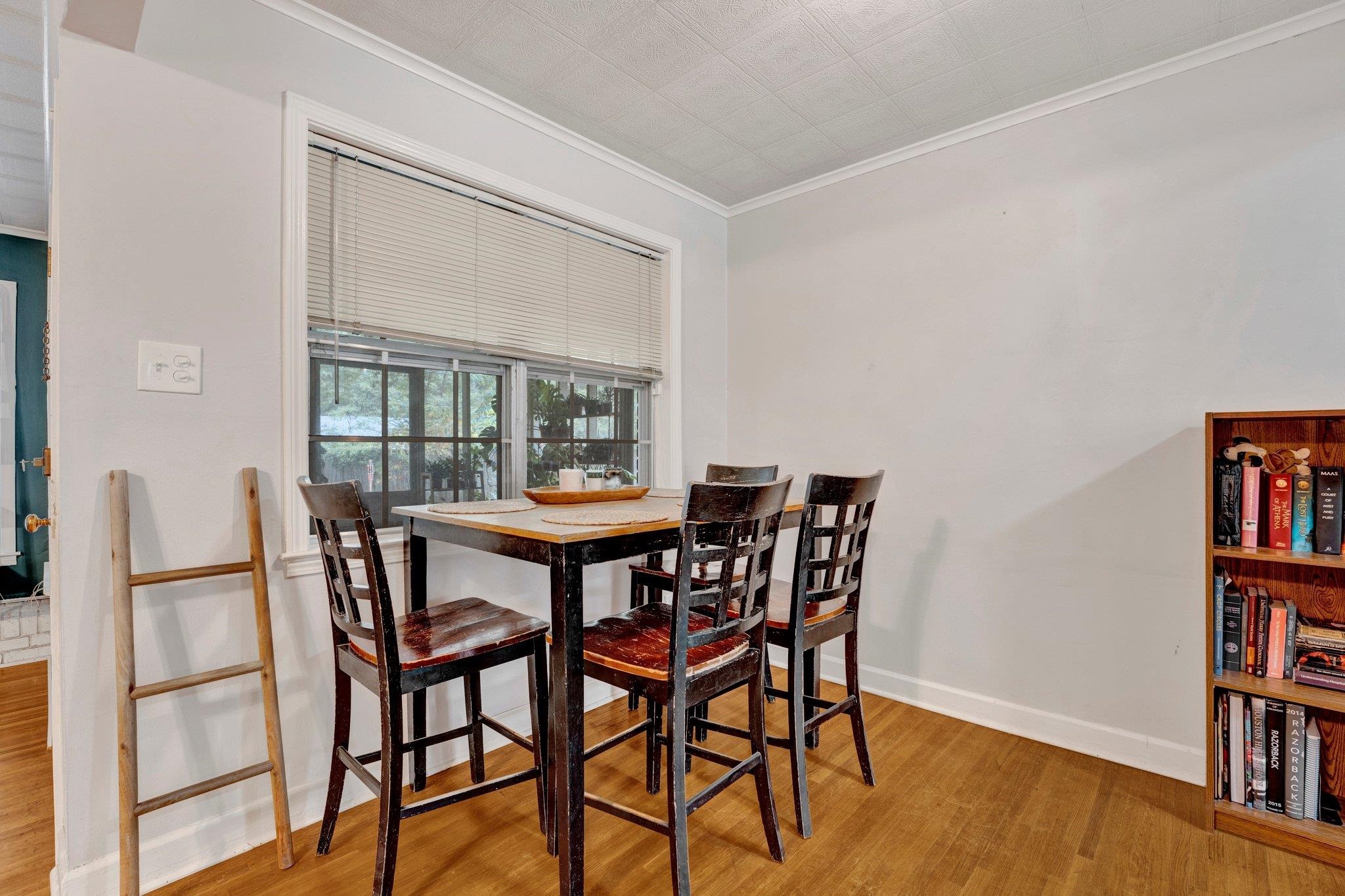 4500 East Dearing Road Memphis, TN 38117 - Photo 9 of 18 Dining area featuring ornamental molding and hardwood / wood-style flooring