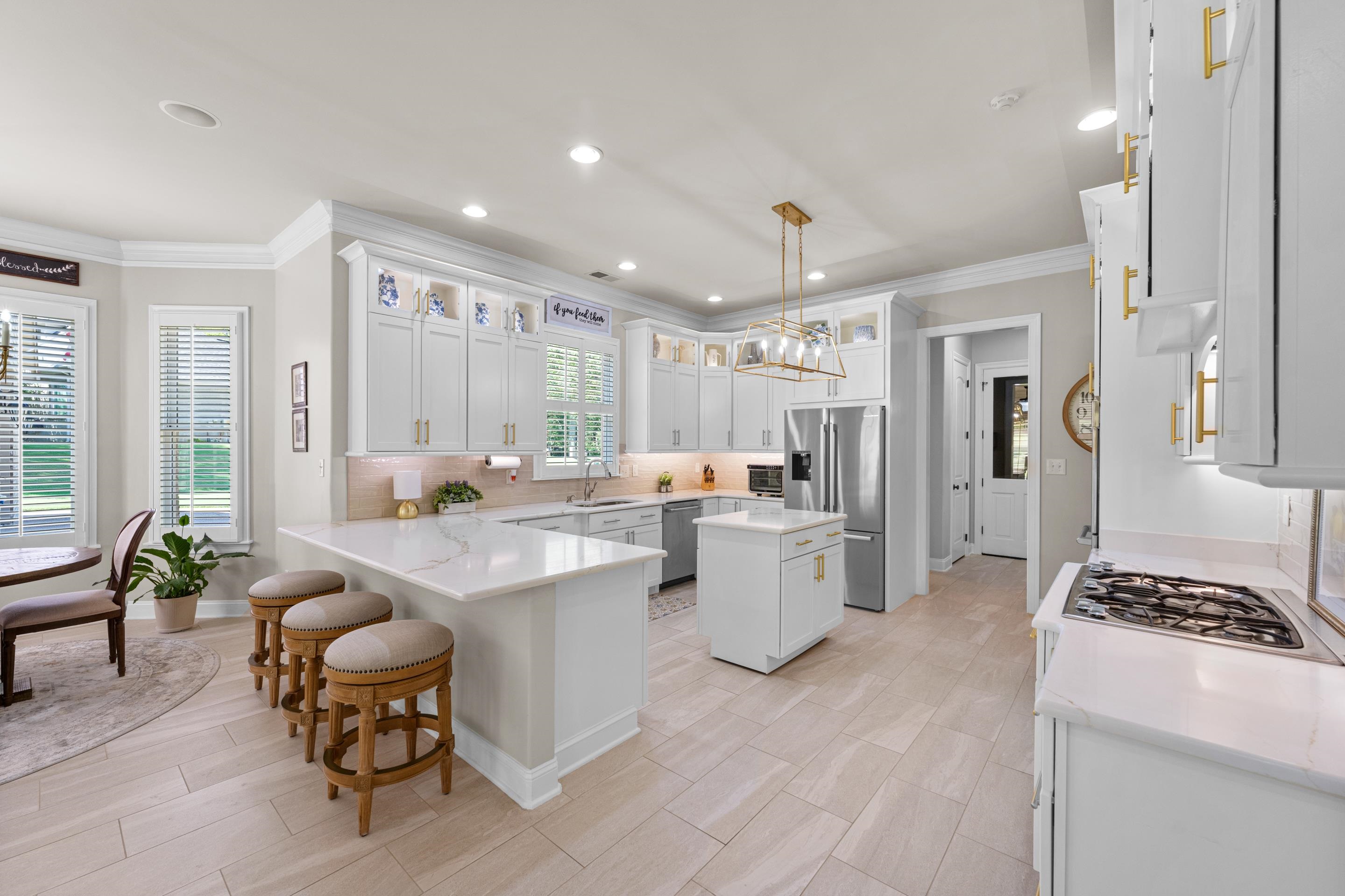 300 Windover Road Piperton, TN 38017 - Photo 8 of 40 This kitchen is dreamy and flows so well. The open light makes it feel so airy.