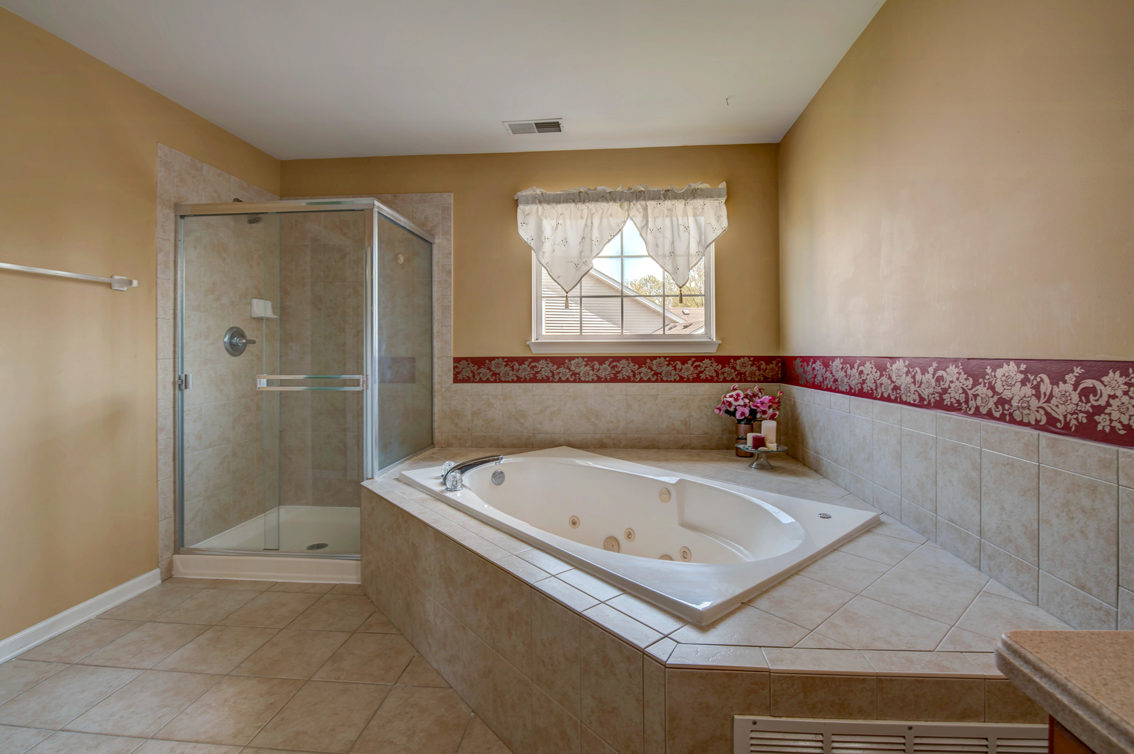 860 Spring Creek Circle Naperville, IL 60565 - Photo 20 of 26 a bathroom with a tub and shower