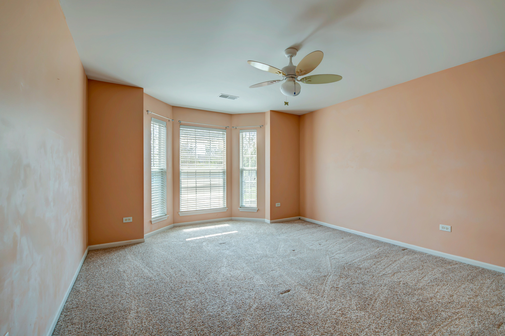 860 Spring Creek Circle Naperville, IL 60565 - Photo 23 of 26 a view of an empty room with a window