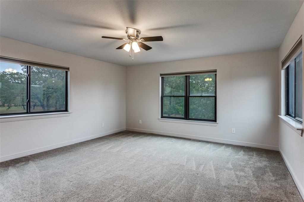 950 Turner Way Mansfield, TX 76063 - Photo 16 of 29 a view of an empty room with windows