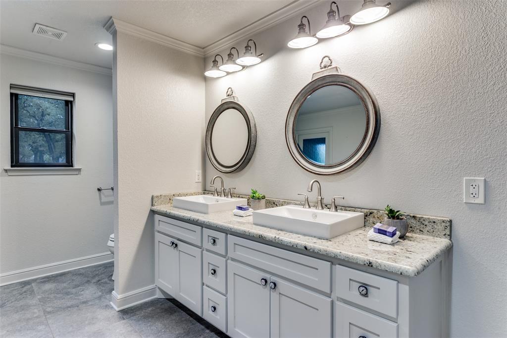 950 Turner Way Mansfield, TX 76063 - Photo 18 of 29 a bathroom with a granite countertop sink and a mirror