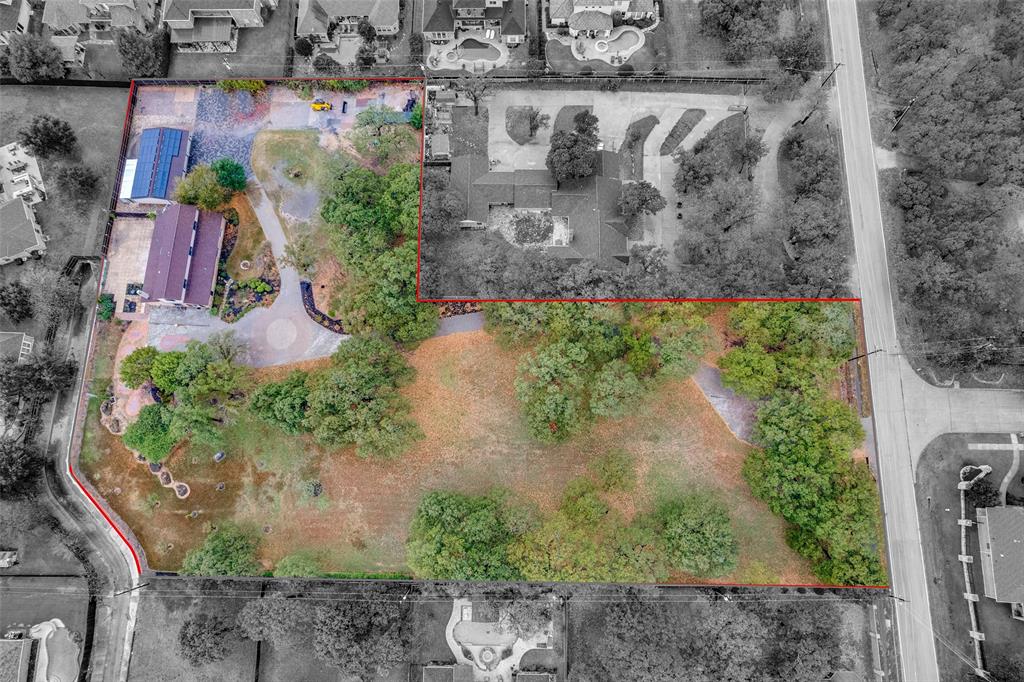 950 Turner Way Mansfield, TX 76063 - Photo 28 of 29 an aerial view of a house with a yard and lake view