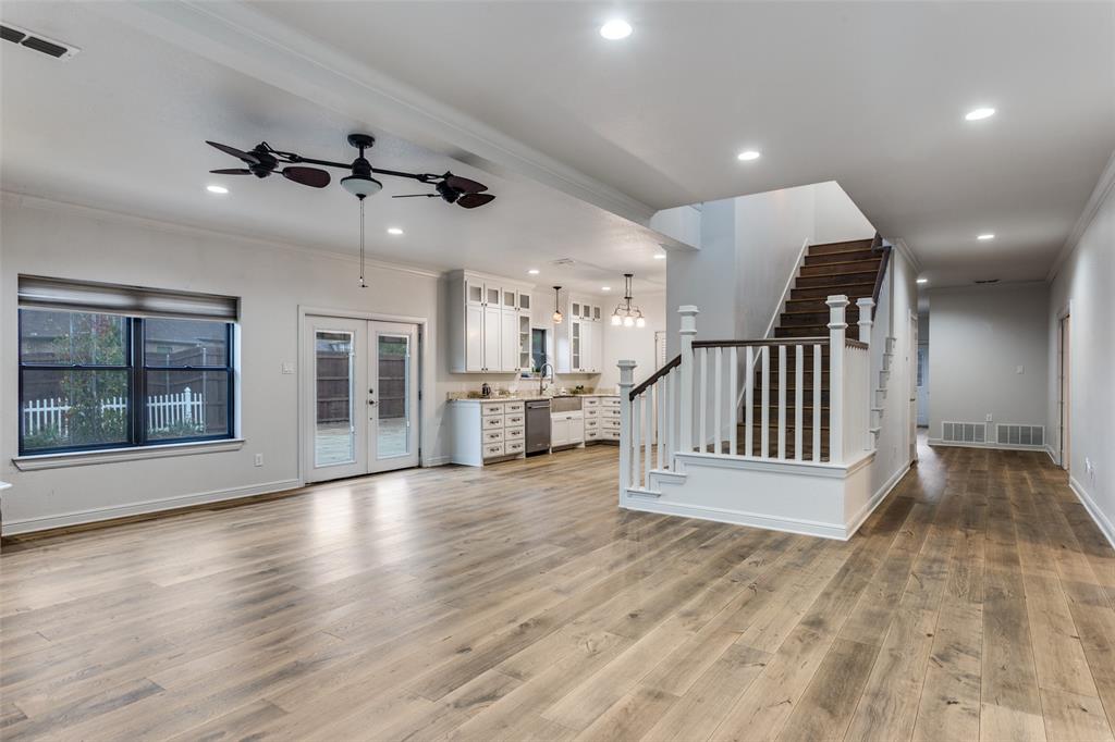 950 Turner Way Mansfield, TX 76063 - Photo 3 of 29 an entryway in a hall with a window and wooden floor