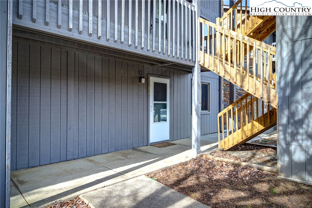 160 Zeb Street, Unit C104 Boone, NC 28607 - Photo 17 of 21 a view of a house with a backyard