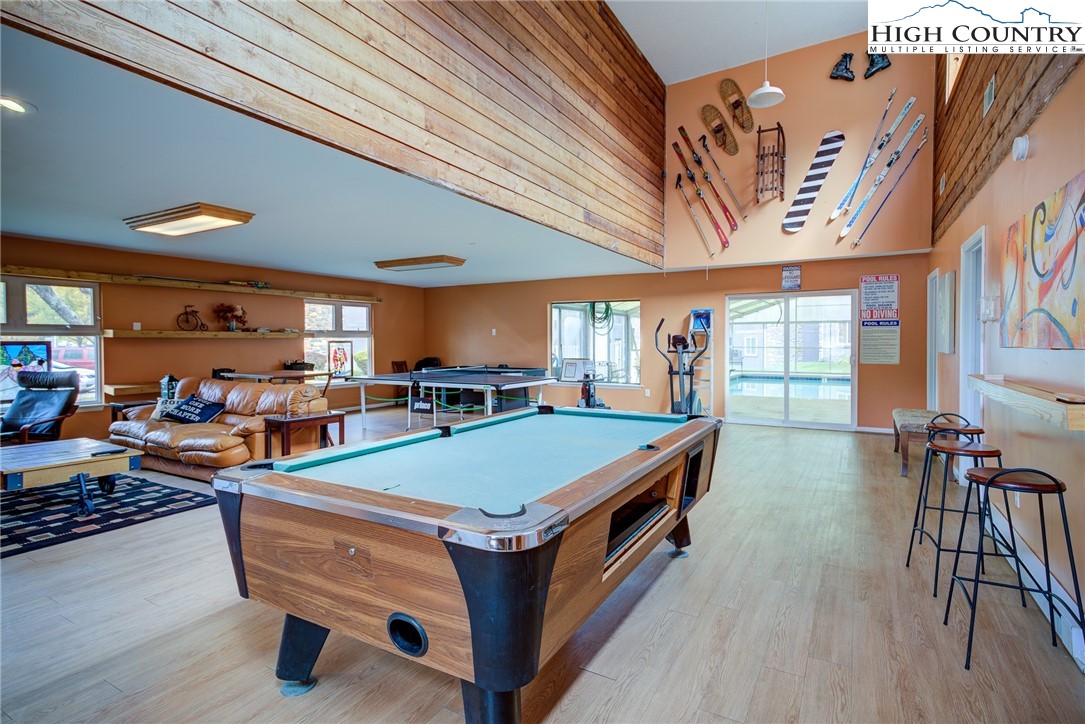 160 Zeb Street, Unit C104 Boone, NC 28607 - Photo 21 of 21 a room with furniture and wooden floor