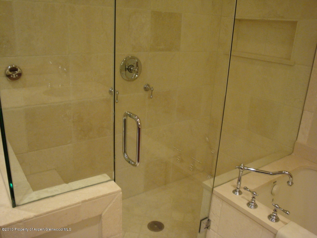 400 Wood Road, Unit 2203 Snowmass Village, CO 81615 - Photo 4 of 8 a bathroom with a shower and a sink