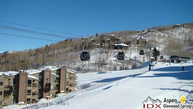 400 Wood Road, Unit 2203 Snowmass Village, CO 81615 - Photo 6 of 8 a view of a city with tall buildings