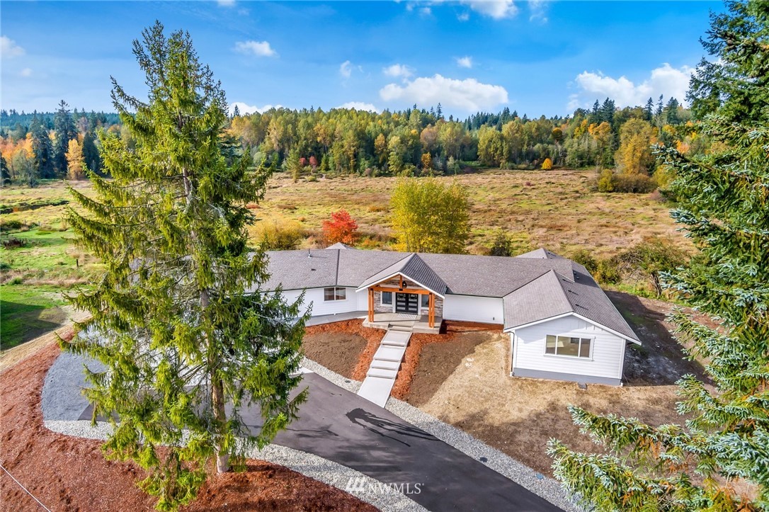 3222 Creswell Road Snohomish, WA 98290 - Photo 1 of 36 an aerial view of a house with lake view