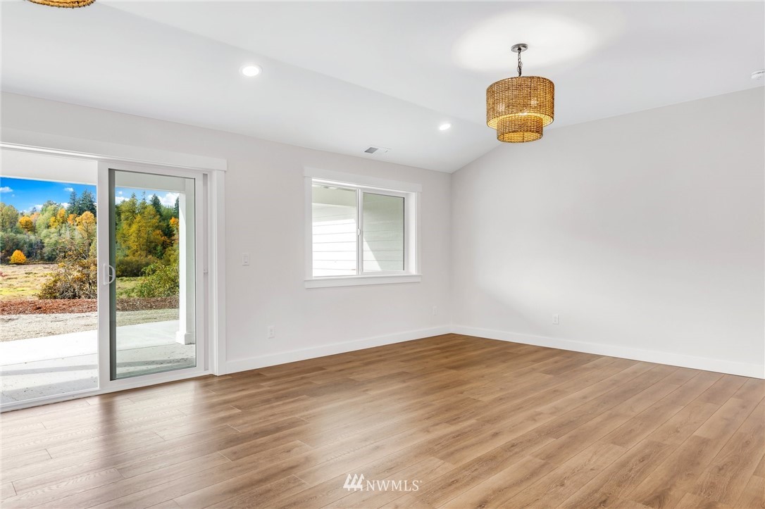 3222 Creswell Road Snohomish, WA 98290 - Photo 21 of 36 a view of a room with window and wooden floor
