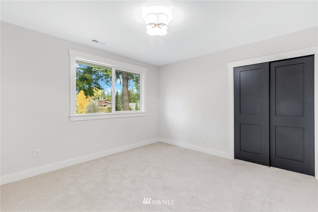 3222 Creswell Road Snohomish, WA 98290 - Photo 24 of 36 an empty room with windows and closet