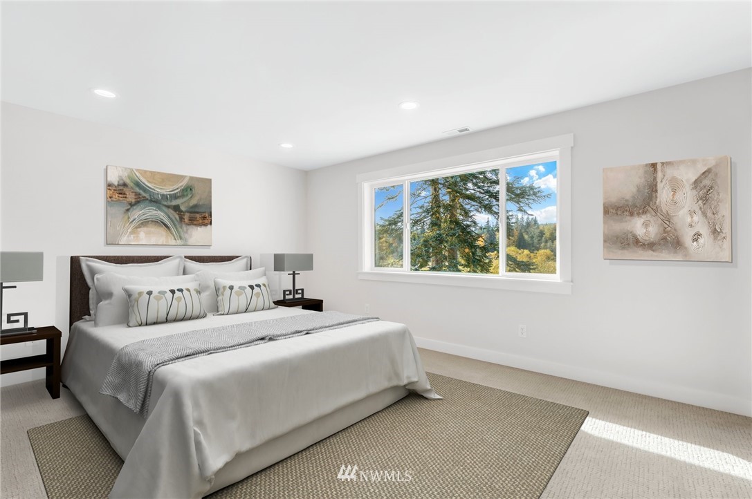 3222 Creswell Road Snohomish, WA 98290 - Photo 29 of 36 a bedroom with a bed and a window