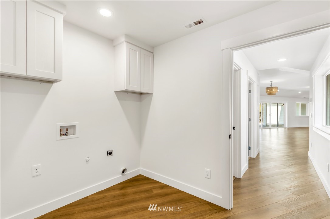 3222 Creswell Road Snohomish, WA 98290 - Photo 35 of 36 a view of a room with wooden floor and cabinet