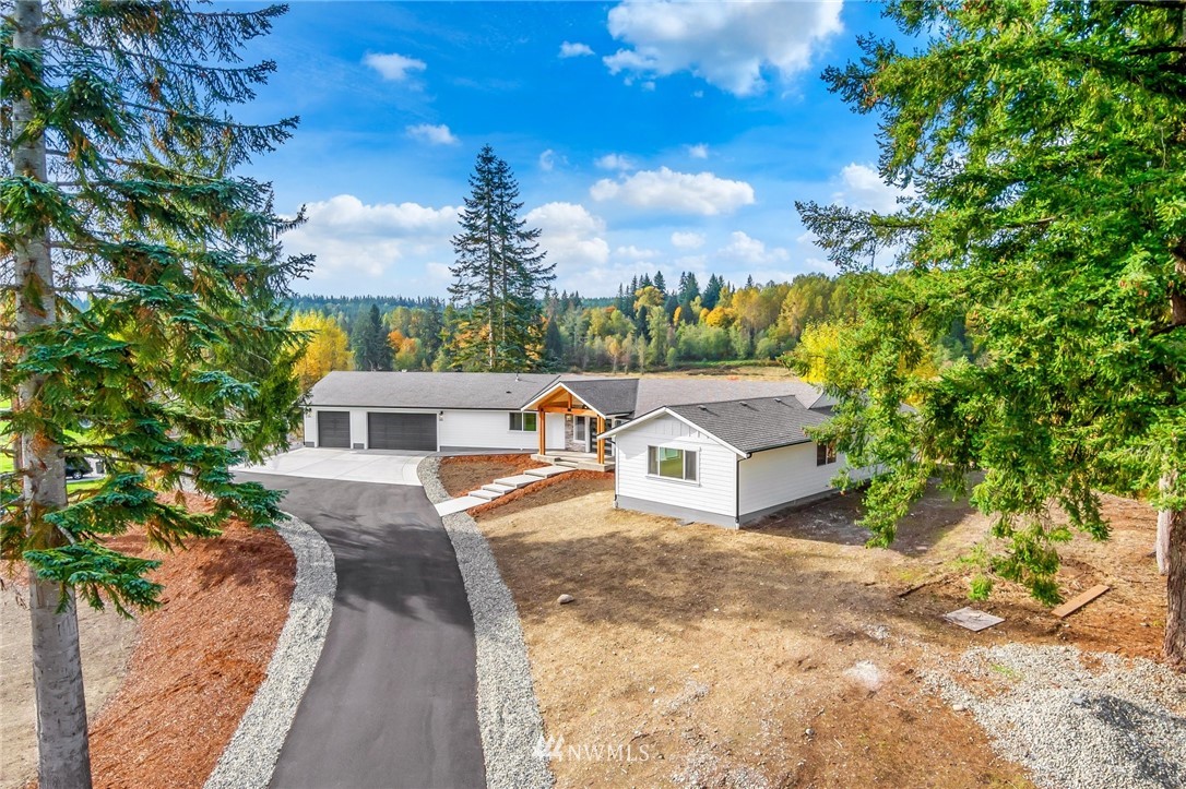 3222 Creswell Road Snohomish, WA 98290 - Photo 7 of 36 a view of a house with a yard