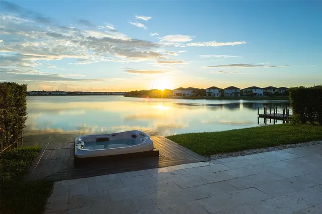 a view of a lake with a yard