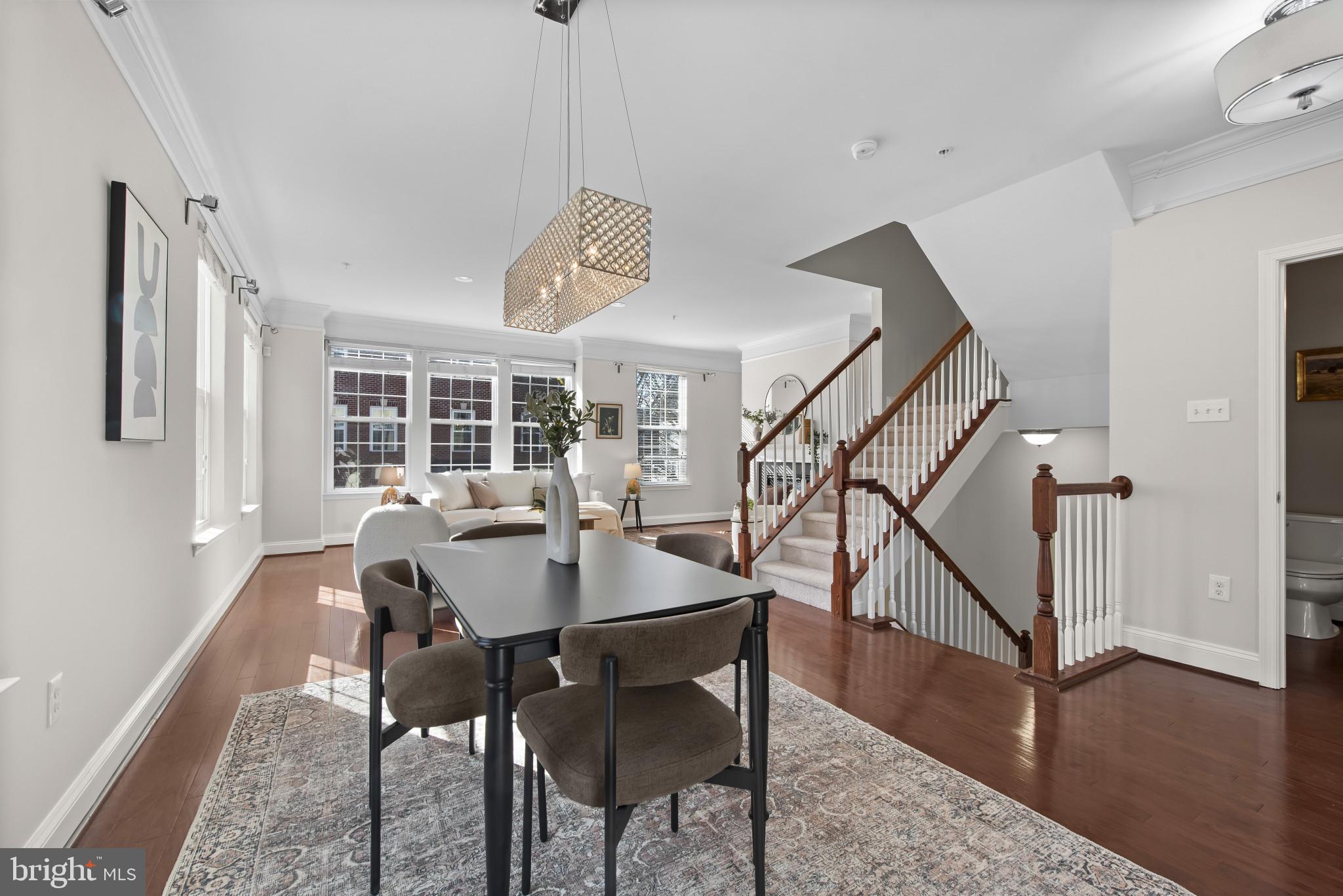 5948 Logans Way Ellicott City, MD 21043 - Photo 15 of 44 a view of a dining room with furniture window and wooden floor