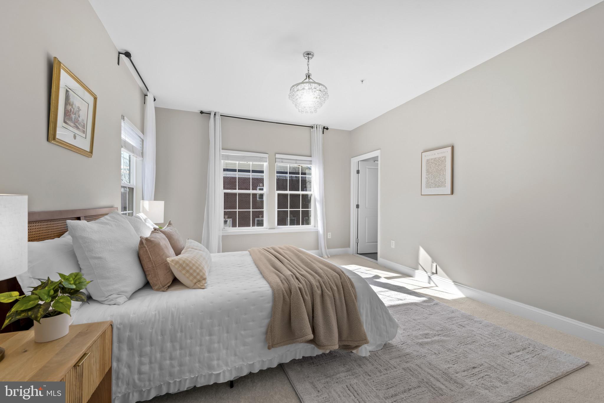 5948 Logans Way Ellicott City, MD 21043 - Photo 26 of 44 a bedroom with a bed and a window
