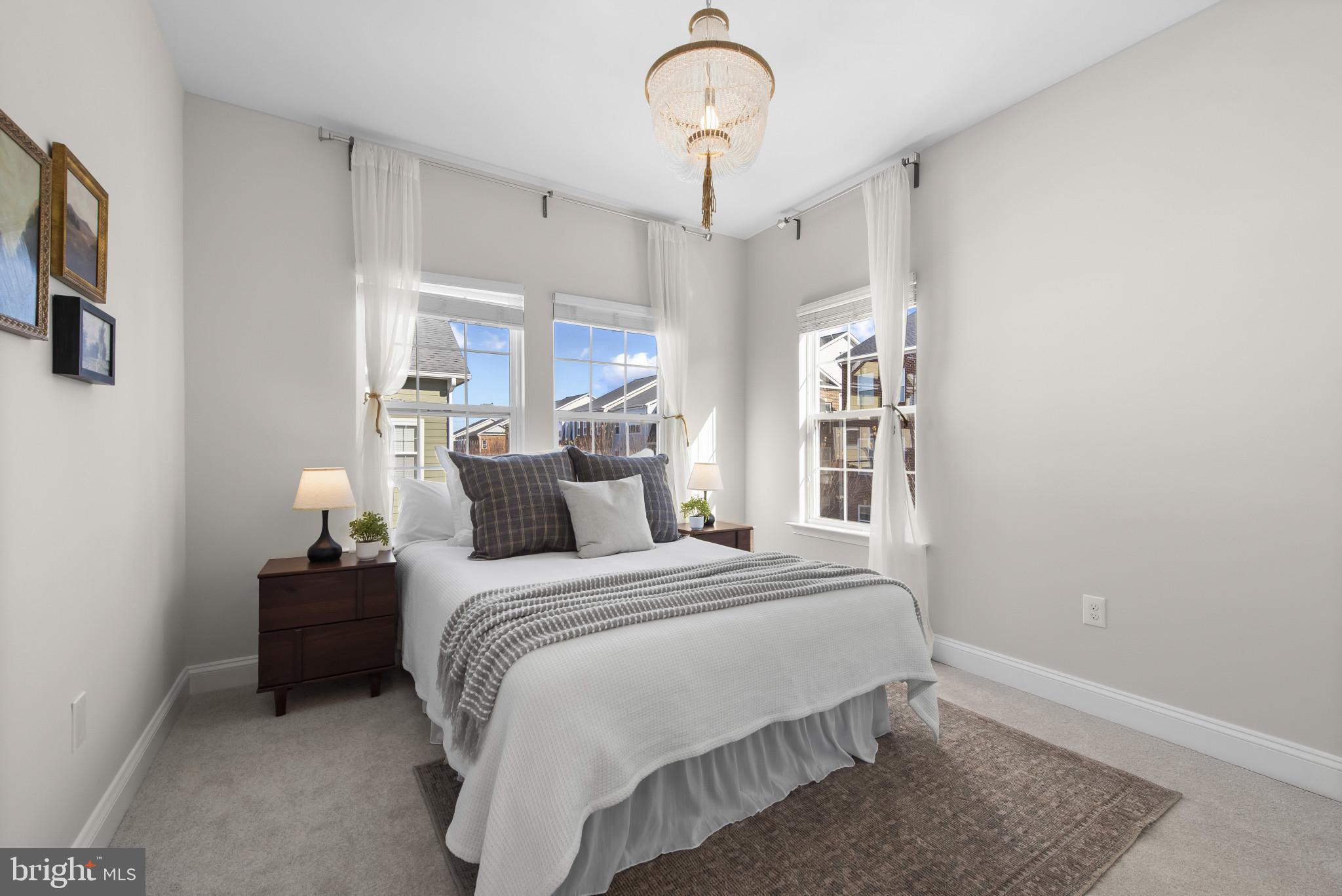 5948 Logans Way Ellicott City, MD 21043 - Photo 33 of 44 a bedroom with bed and window