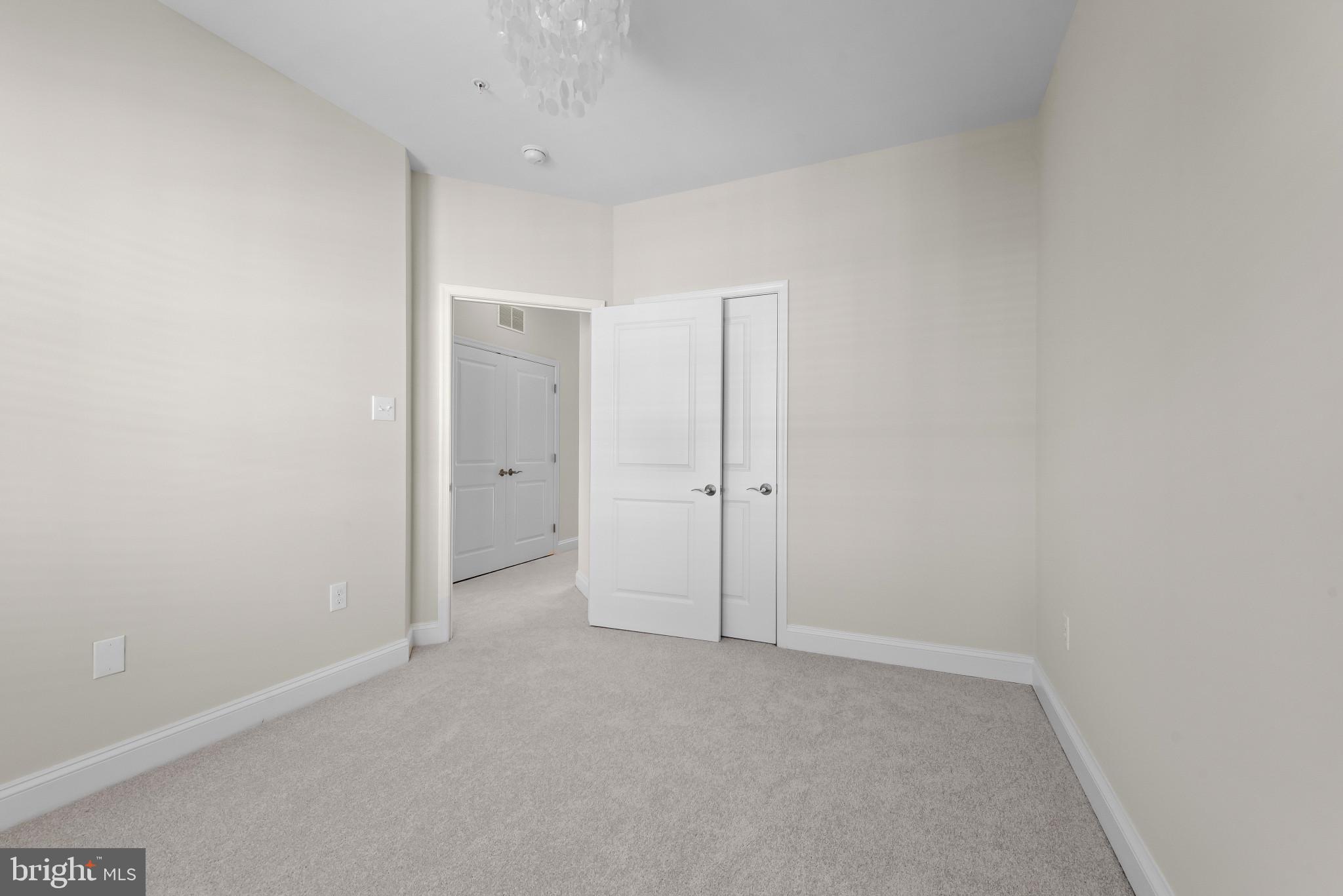 5948 Logans Way Ellicott City, MD 21043 - Photo 39 of 44 a view of an empty room