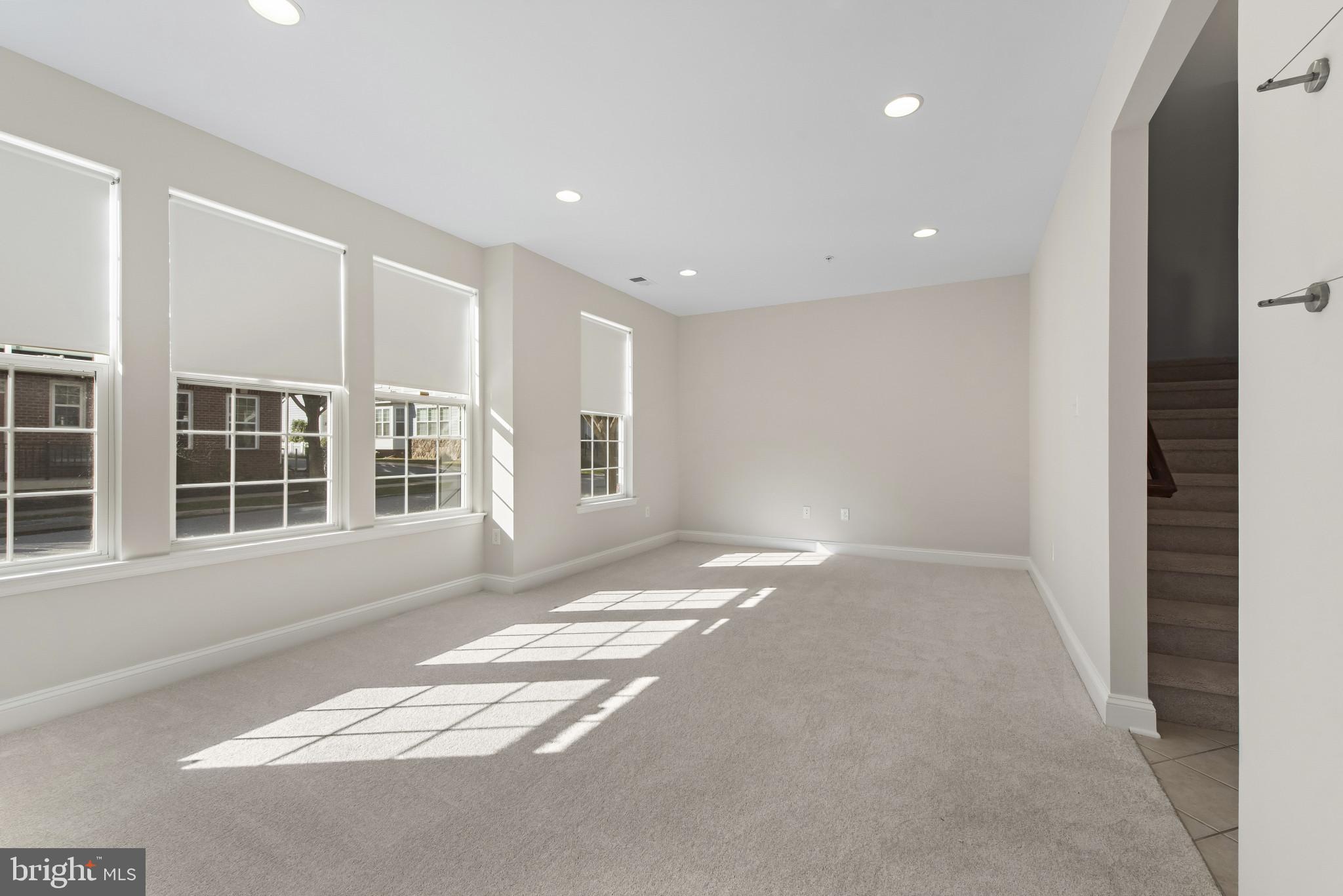 5948 Logans Way Ellicott City, MD 21043 - Photo 5 of 44 a view of an empty room with a window