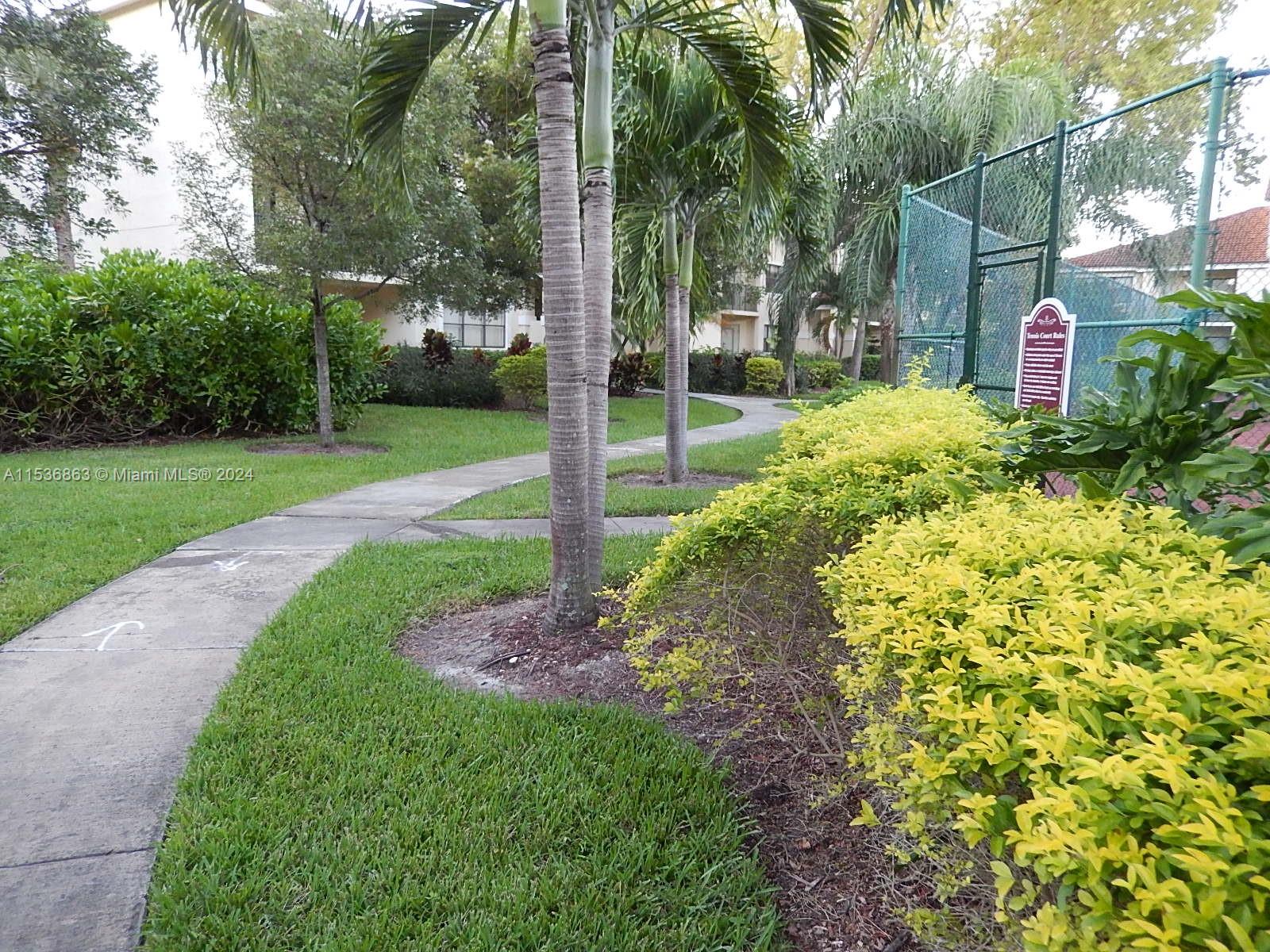 650 South Park Road, Unit 135 Hollywood, FL 33021 - Photo 31 of 36 a view of a garden with a fountain