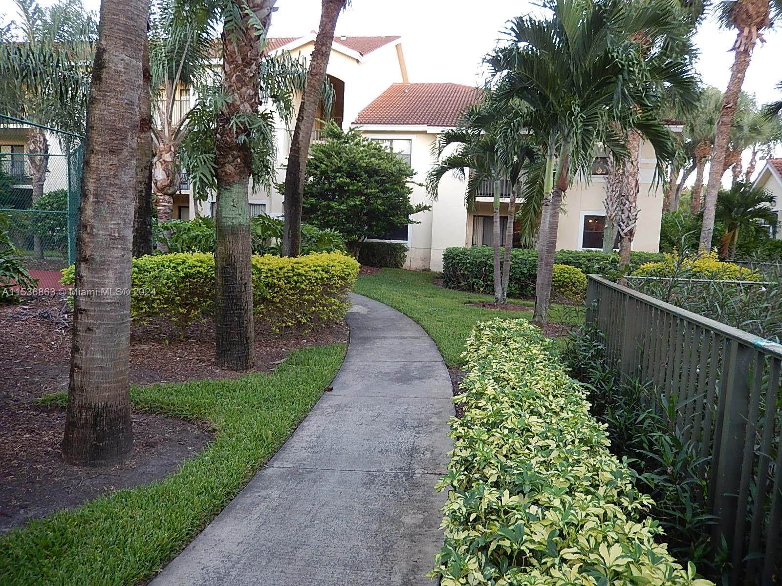 650 South Park Road, Unit 135 Hollywood, FL 33021 - Photo 33 of 36 a view of a garden with a fountain